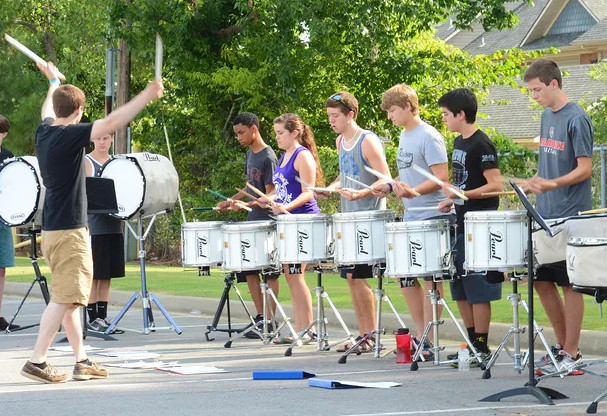 high school drumline rehearsing